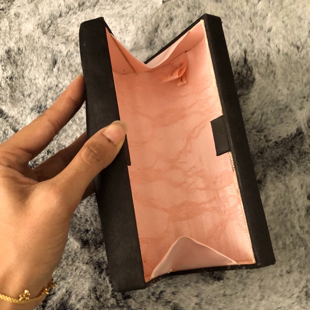 Black clutch with pink lace